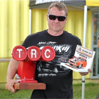 Mark Gapp with the Kumeu Classic Car and Hot Rod Festival Wildbunch Wars winners trophy and the TRC perpetual
                 Wild Bunch Champion trophy. 2 & 3 Jan 2021. Masterton Motorplex.<br>Photo by Grahams Glimpses Photography.