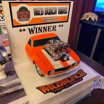 Mark Gapp collected the Kumeu Classic Car and Hot Rod Festival Wildbunch Wars winners trophy. 2 & 3 Jan 2021. Masterton Motorplex